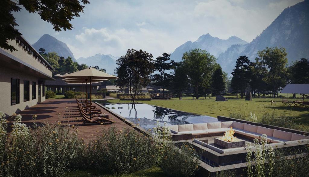 une piscine avec un canapé et un parasol dans un champ dans l'établissement Jiuzhaigou Valley Scenic and Historic Interest Area Stargazing · Vacilando Resort, à Tazang