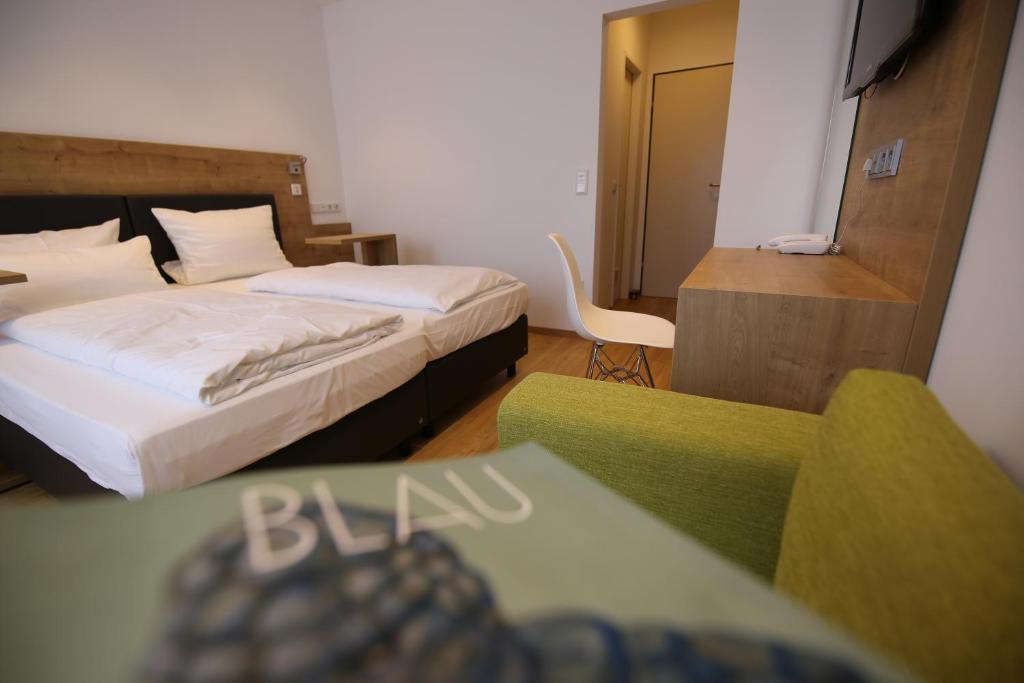 Postel nebo postele na pokoji v ubytování Hotel Knorz