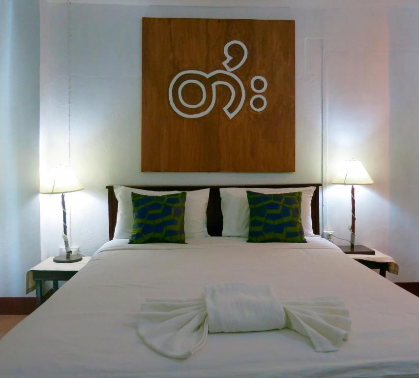 Postel nebo postele na pokoji v ubytování Yoont Hotel