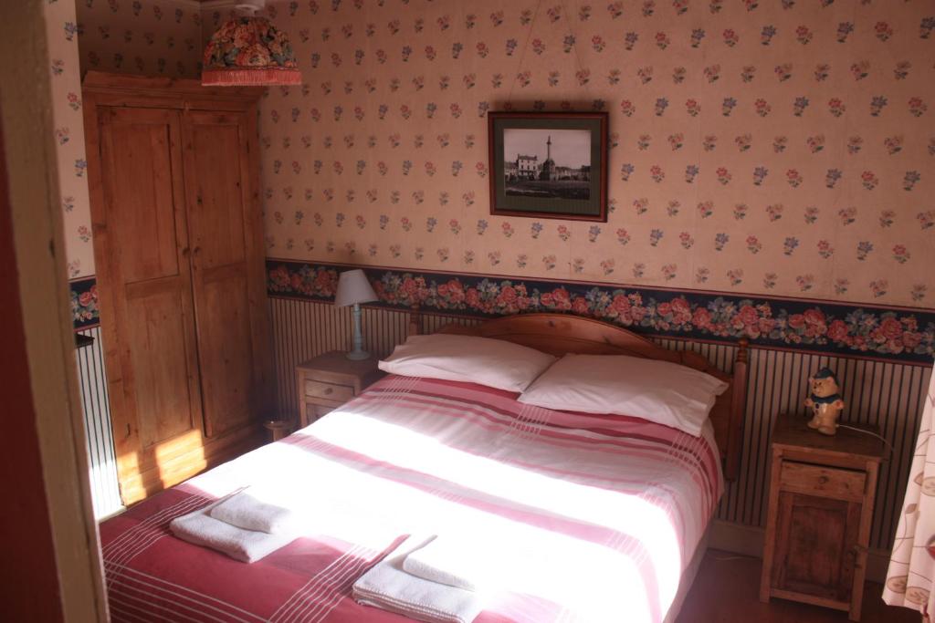 Postel nebo postele na pokoji v ubytování Boffin Lodge Guest House