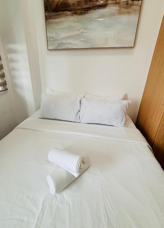 Katil atau katil-katil dalam bilik di Peaceful Escape with City Convenience