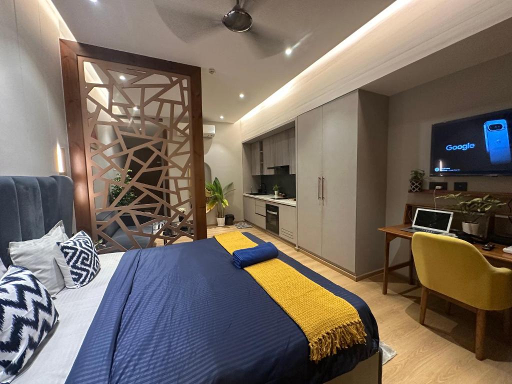 Ένα ή περισσότερα κρεβάτια σε δωμάτιο στο Mon Homes