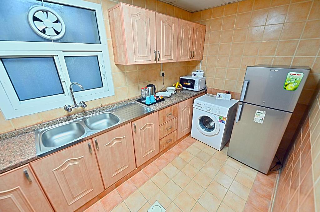 Ewan Tower Hotel Apartments - Resim 23