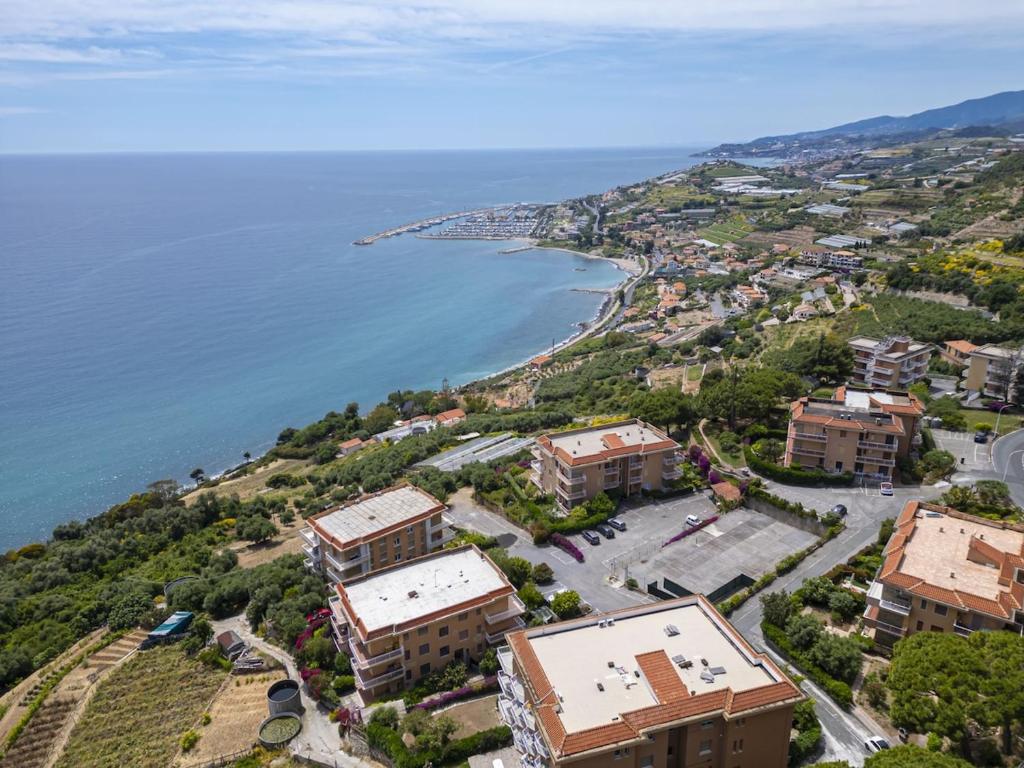 an aerial view of a town next to the ocean at La casa di Sara in Cipressa