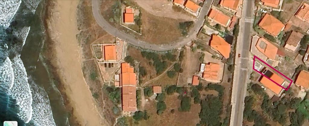an overhead view of a house on the beach at Horizzonte Blu in Porto Alabe