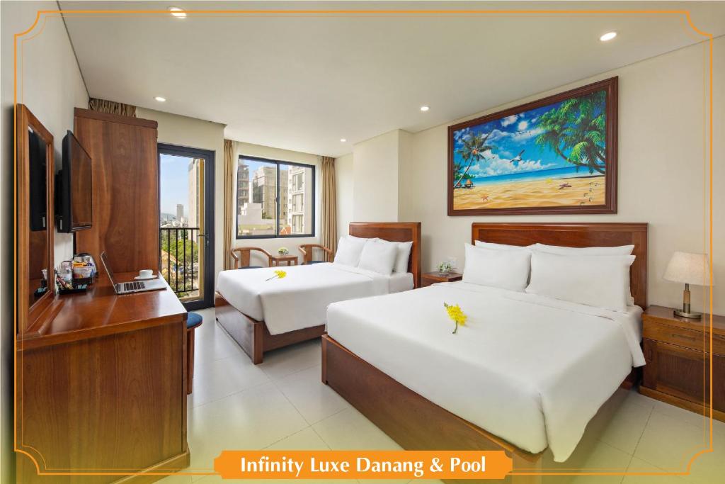 Ένα ή περισσότερα κρεβάτια σε δωμάτιο στο Cherry Beach Hotel