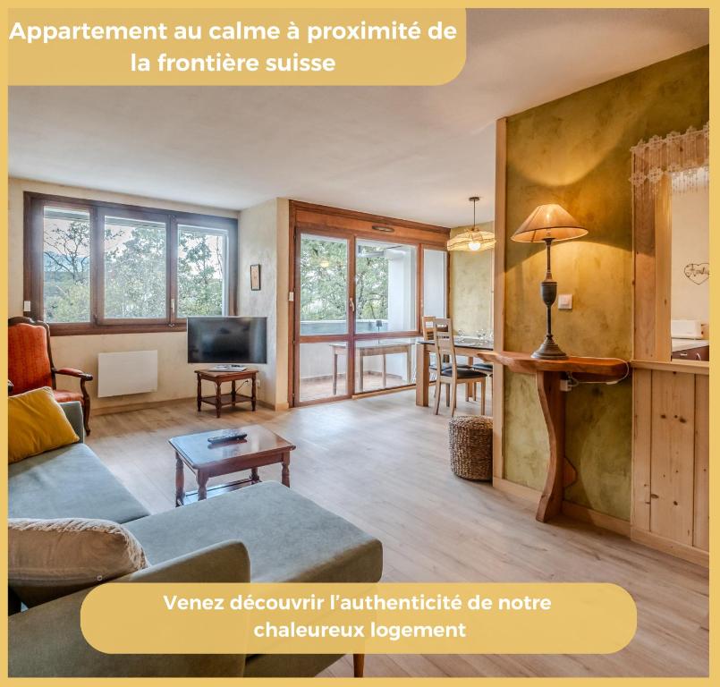 an open living room with a couch and a table at Chez Isabelle & Urbain I T3 I Saint-Julien in Saint-Julien-en-Genevois