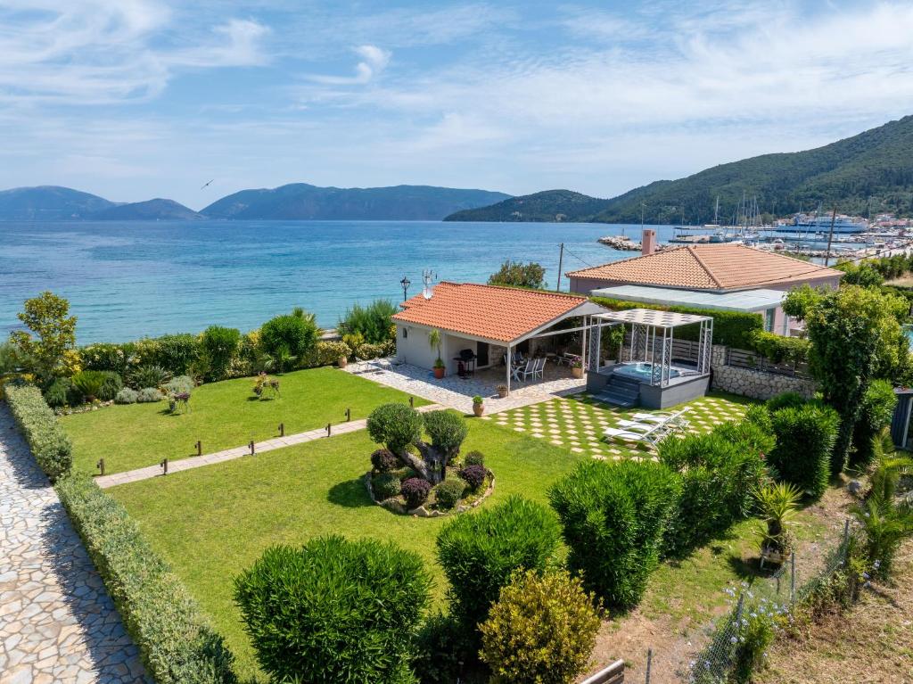 an aerial view of a house with a view of the water at Endless Blue House in Sami