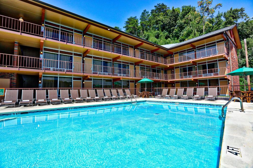 a pool in front of a hotel at Wild Bear Inn in Pigeon Forge