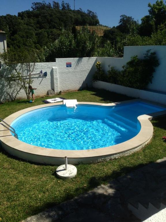 
The swimming pool at or near Casa Dos Oliva

