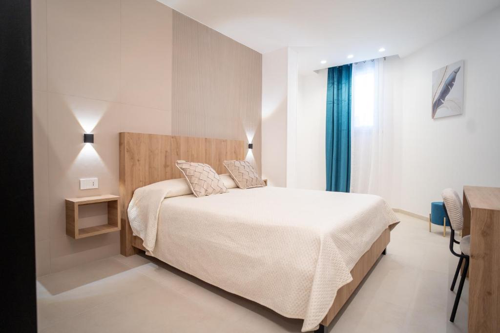Ένα ή περισσότερα κρεβάτια σε δωμάτιο στο B&B Villa M S