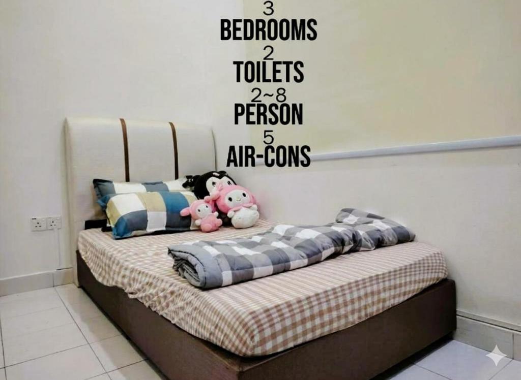a bed with bedrooms toilets and a person art towns at HomeStay Sungai Petani Kedah in Sungai Petani