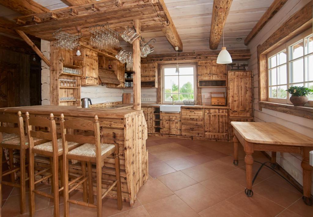 Kuchyň nebo kuchyňský kout v ubytování Dabintos slėnis