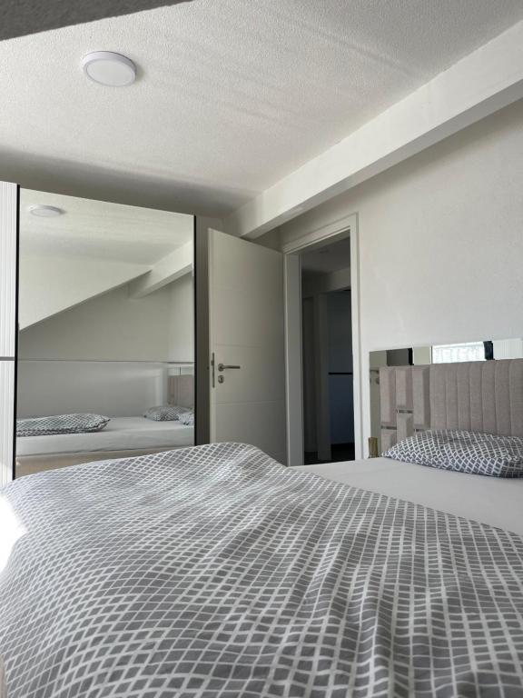 Postel nebo postele na pokoji v ubytování Neue stilvolle Wohnung in Tuttlingen