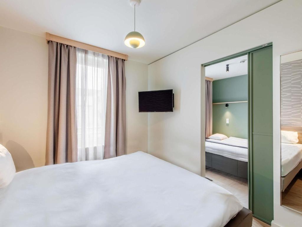 Aparthotel Adagio Muenchen City - Resim 18