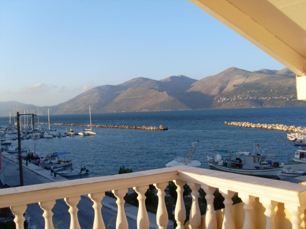 a view of the marina from the balcony of a house at Mariangela Apartments in Lixouri