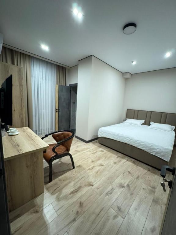 Postel nebo postele na pokoji v ubytování Mokk Hotel