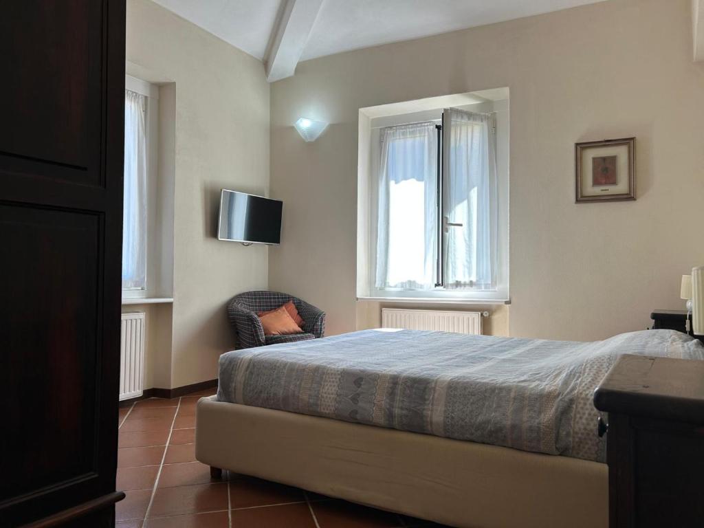 Postel nebo postele na pokoji v ubytování Casa Marcella