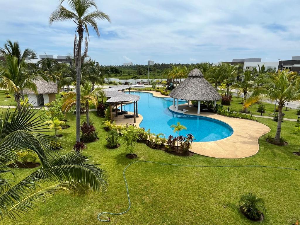 an overhead view of a pool at a resort at Lyra Vacacional Acapulco in Acapulco