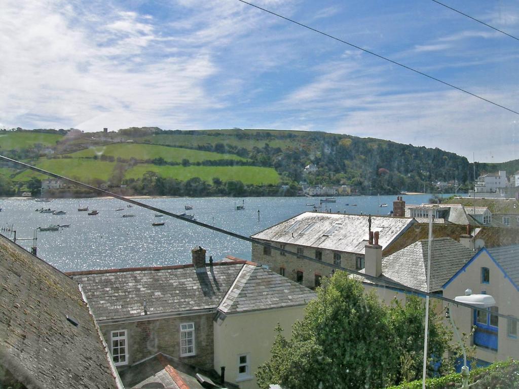 a view of a large body of water with boats at Church St 1 Upper Apartment - Cottage in Salcombe