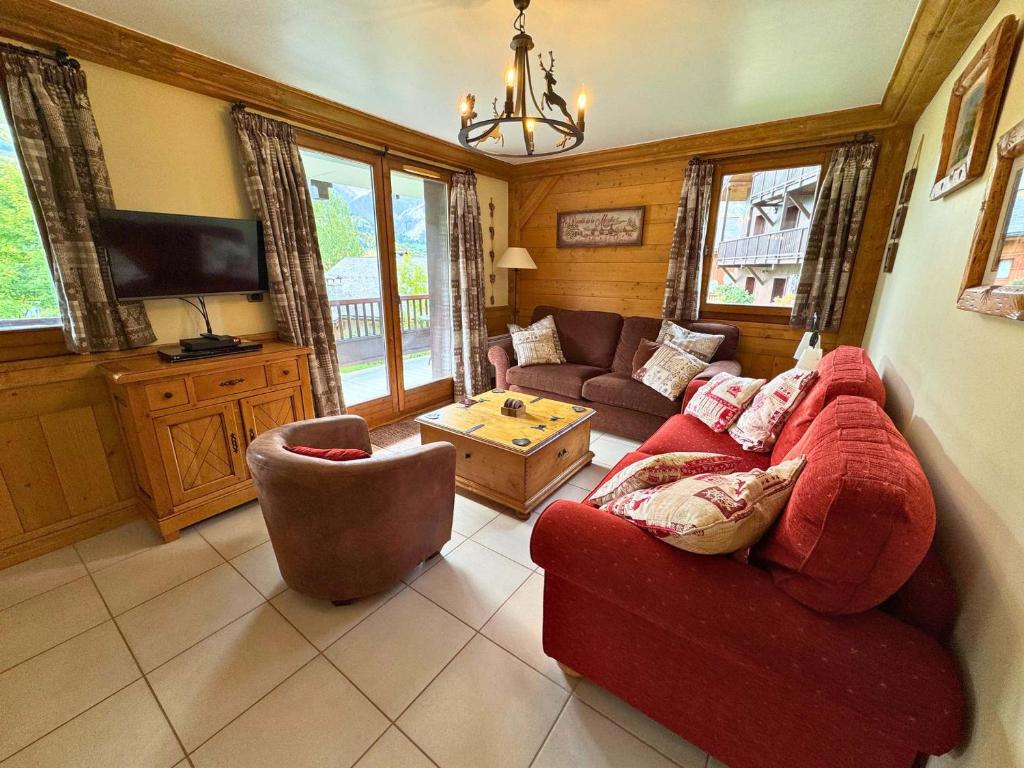 TV a/nebo společenská místnost v ubytování Appartement confortable pour 6 pers. à Saint-Martin, proche pistes, parking, WiFi - FR-1-452-395