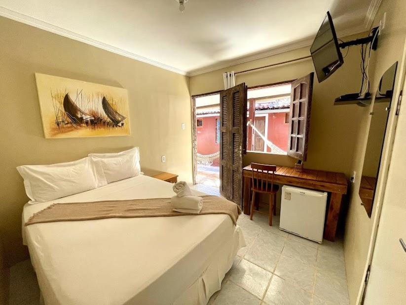 Ένα ή περισσότερα κρεβάτια σε δωμάτιο στο Viva Jeri Jericoacoara