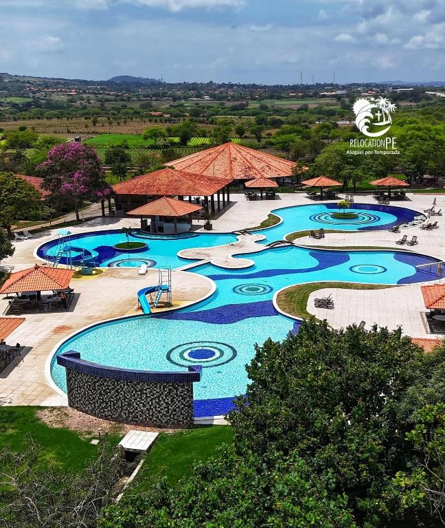 an overhead view of a pool at a resort at Ground floor flat with two suites (up to 8 people) at Canarius Resort in Gravatá in Gravatá