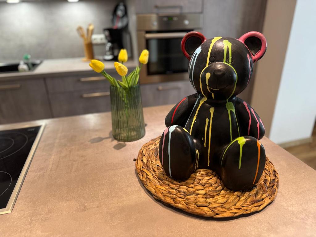 a statue of a teddy bear sitting on a counter at Parkblick in Thale