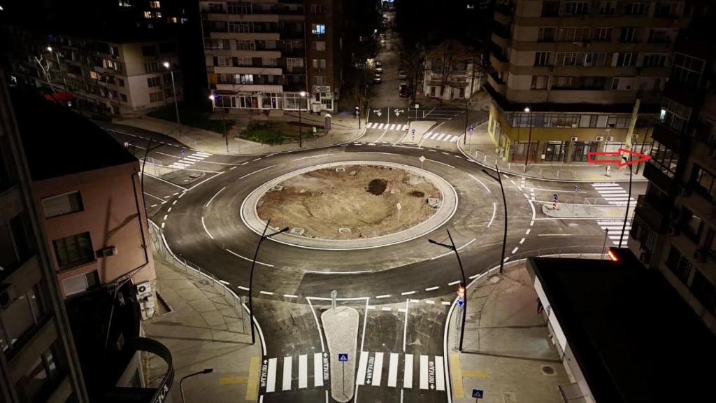 a city street at night with a large at Апартамент с една спалня в ценъра на града in Yambol