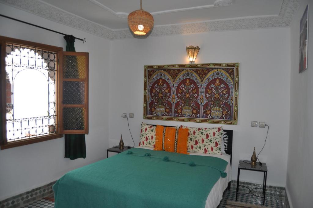 Postel nebo postele na pokoji v ubytování Riad Tafoukt Fes