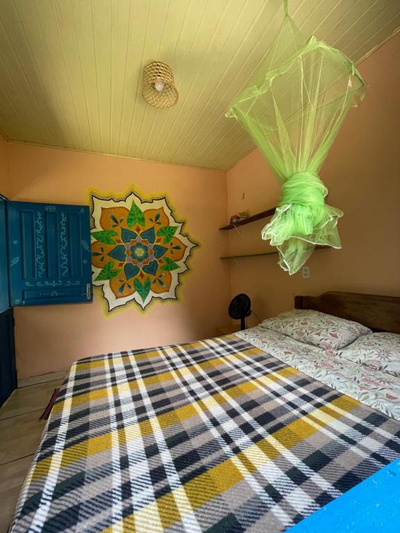 Katil atau katil-katil dalam bilik di Caminho das pedras-Medicina, Consciência e espiritualidade- Hospedaria na floresta com saída ao Igarapé