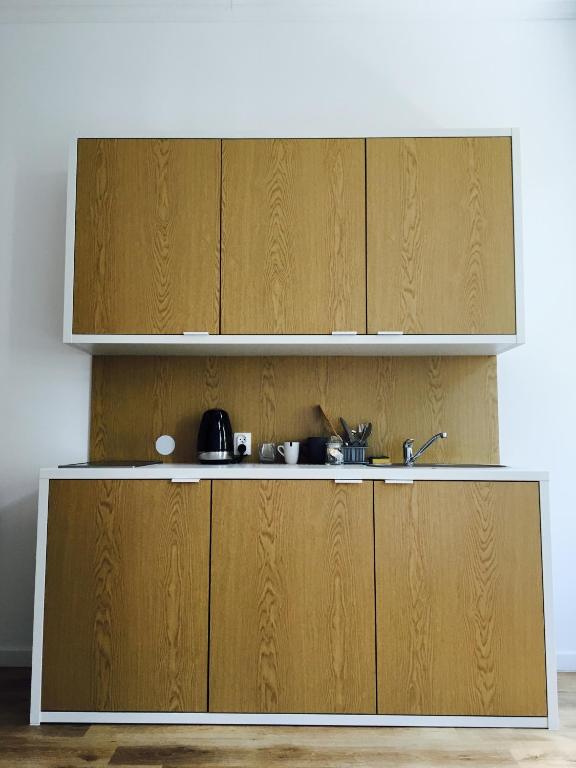 Kuchyňa alebo kuchynka v ubytovaní Apartamenty przy Gimnazjalnej