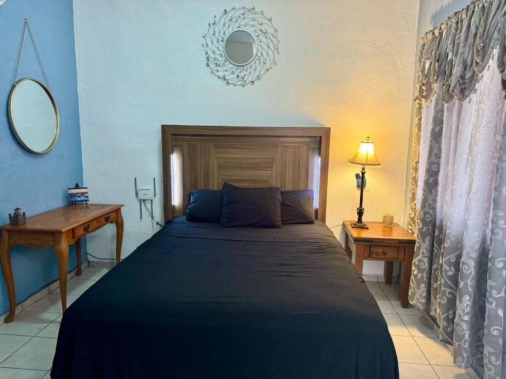 Ένα ή περισσότερα κρεβάτια σε δωμάτιο στο Casa las Brisas