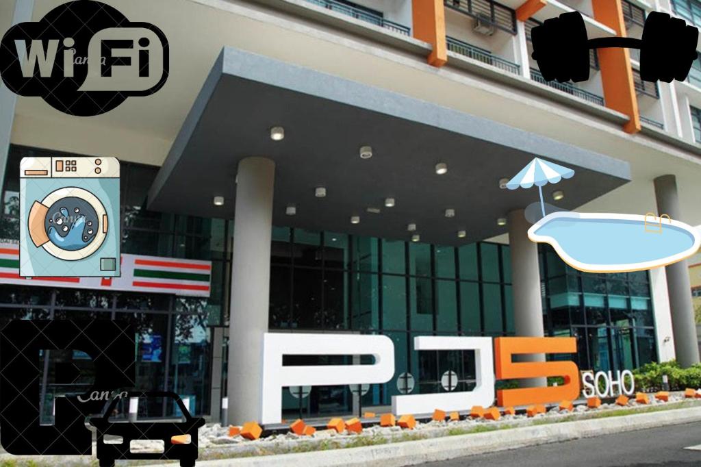 a building with a car parked in front of it at PJ5 Soho Studio Room Washer WiFi Parking in Petaling Jaya