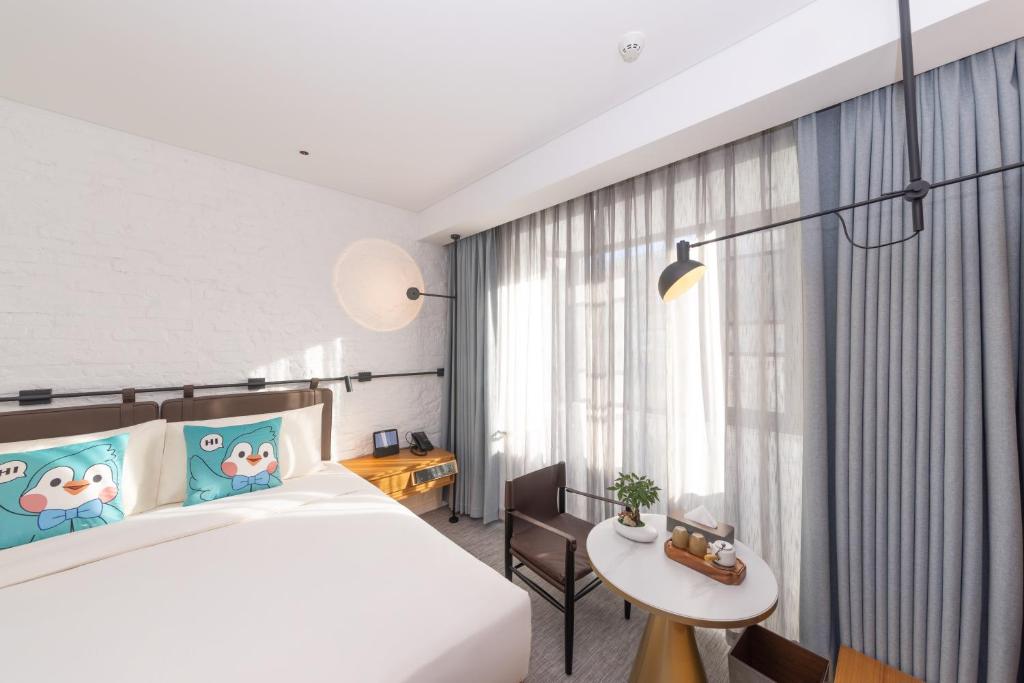 Hefeng Xinyi Hotel 和风心驿酒店劲松店 photo
