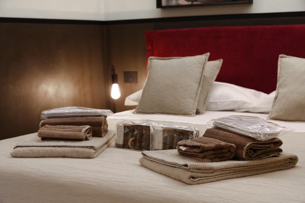 Ένα ή περισσότερα κρεβάτια σε δωμάτιο στο Stelle di Verona - Polaris