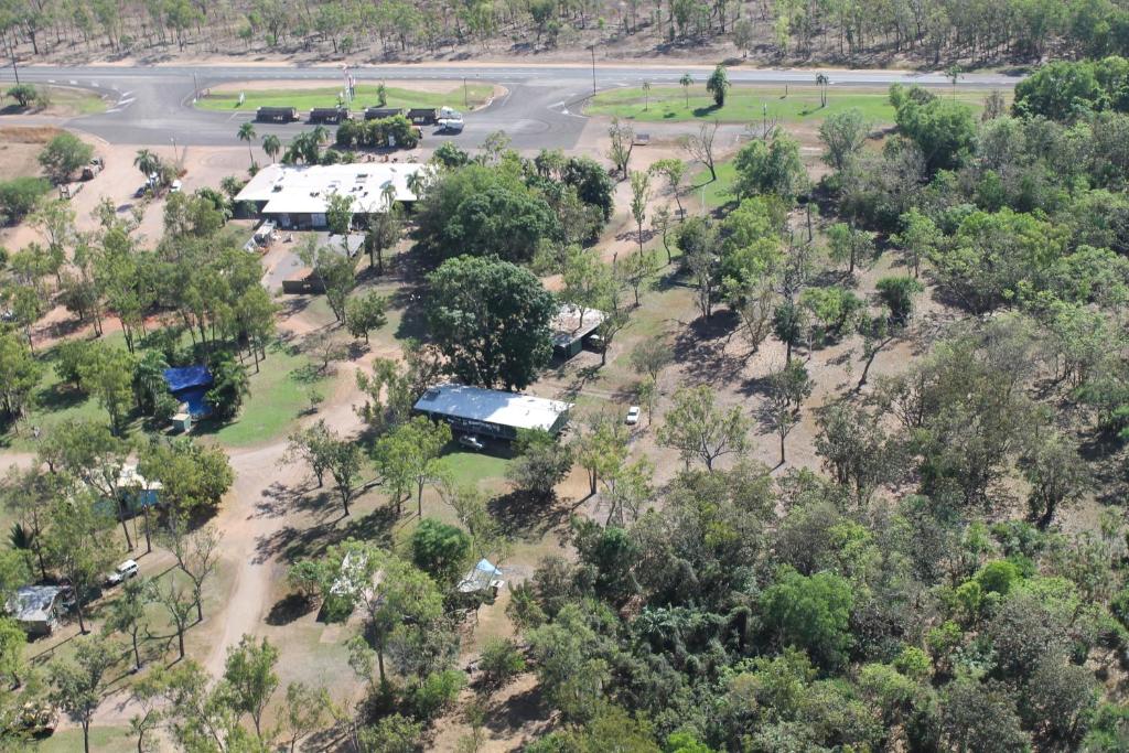 an aerial view of a park with trees and a road at Corroboree Park Tavern in Marrakai