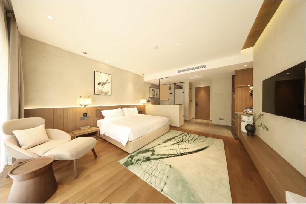 TV a/nebo společenská místnost v ubytování Floral Hotel Changbaishan Baihe Left Bank