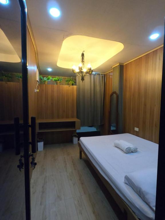 Ένα ή περισσότερα κρεβάτια σε δωμάτιο στο Ilali Budget Accommodation