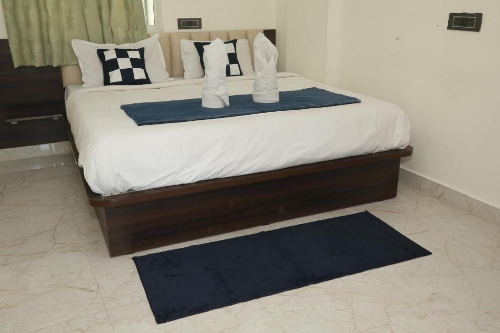 Postel nebo postele na pokoji v ubytování Hotel Rest O ITPL