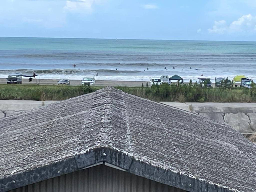 a view of the beach from the roof of a building at Iioka-classic in Asahi