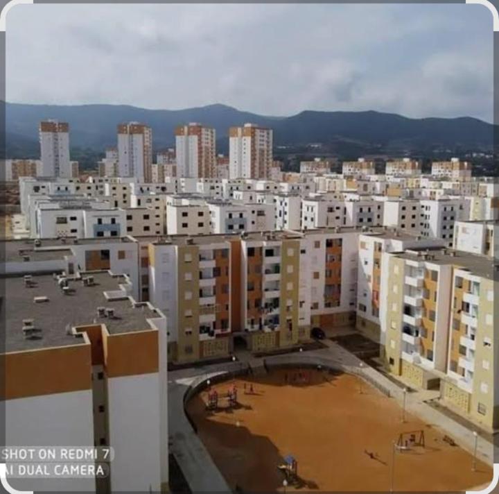 a view of a large city with tall buildings at Chafia in Skikda