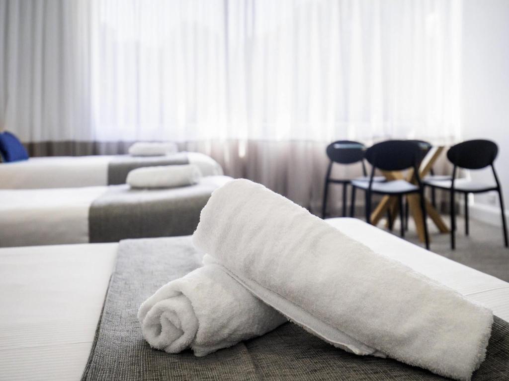 
Standard Room with Queen and 2 Single Beds
