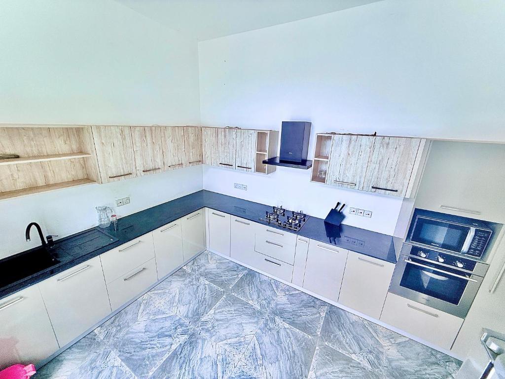 Una cocina o cocineta en Alex's Place