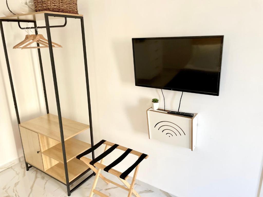 Una televisión o centro de entretenimiento en Dimora San Mario