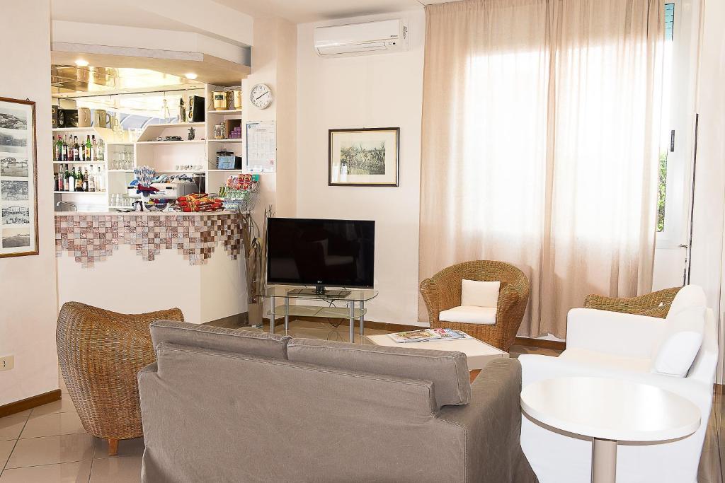 TV a/nebo společenská místnost v ubytování Hotel Conchiglia