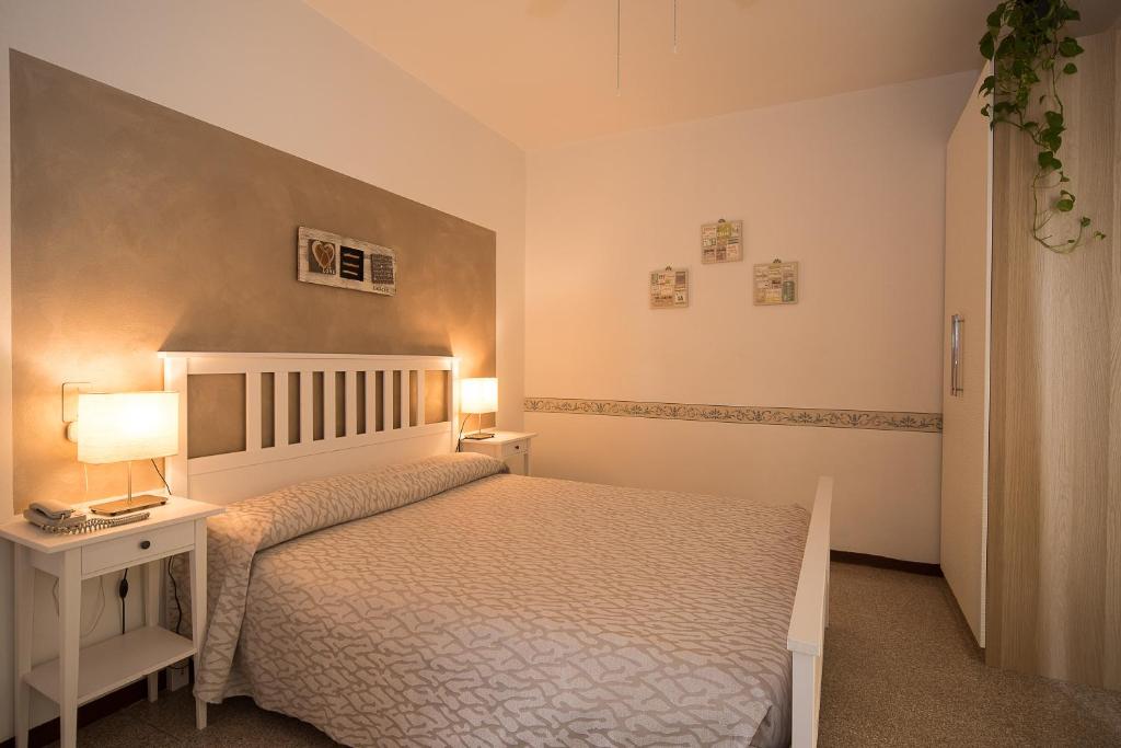 Postel nebo postele na pokoji v ubytování Hotel Conchiglia
