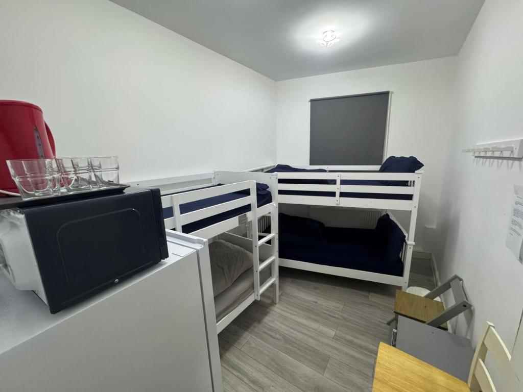 Η κουζίνα ή μικρή κουζίνα στο Family room in Zone 2