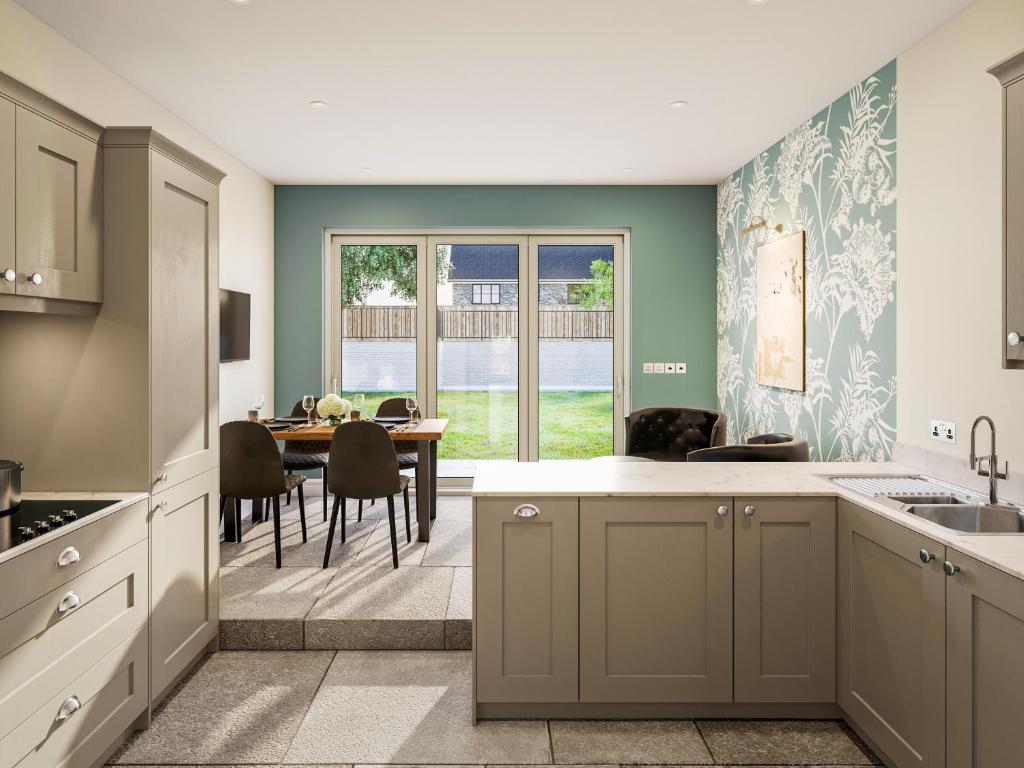 Køkken eller tekøkken på Huxley's Cottage - Uk49813