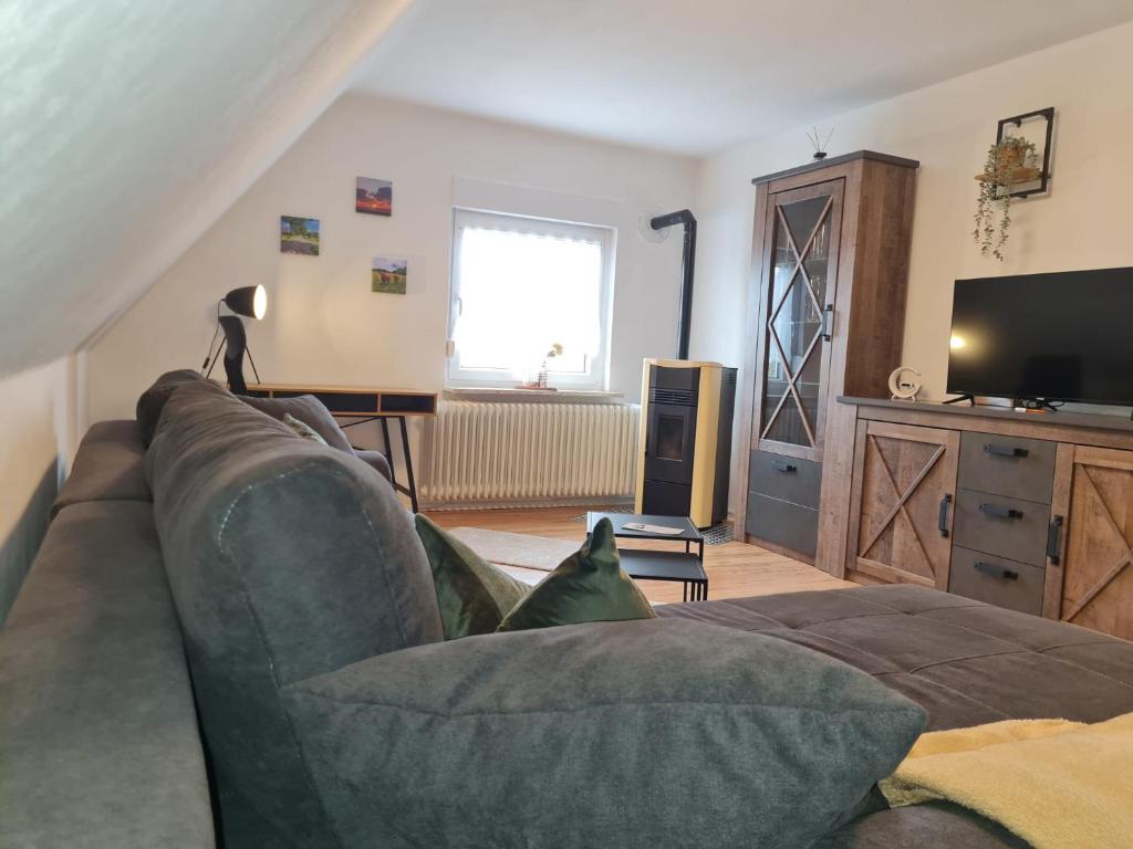 Posezení v ubytování Ferienwohnung FeWo Plaggenburg - Das Familienreich